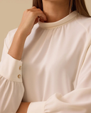 Seçil dik yaka pile detaylı bluz