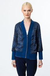 Ürün Özellikleri: V yaka, desenli, ribanalı, fermuar kapamalı, astarsız On